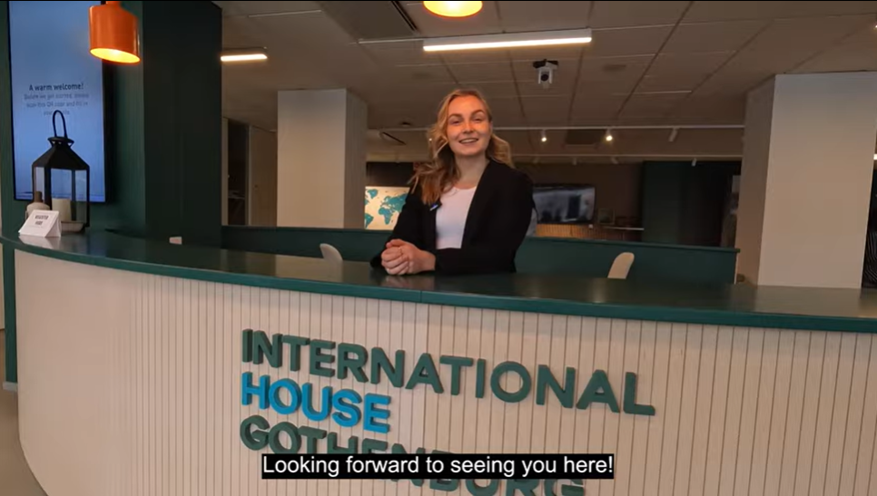 Woman behind a desk at International House Gothenburg
