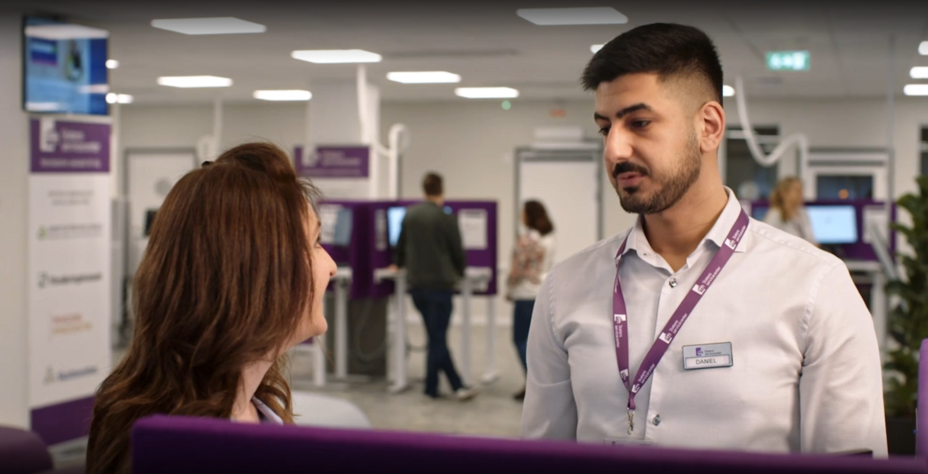 Staff at a Swedish state service centre guiding a visitor