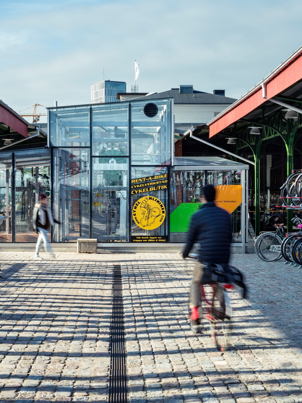 People biking in in a town